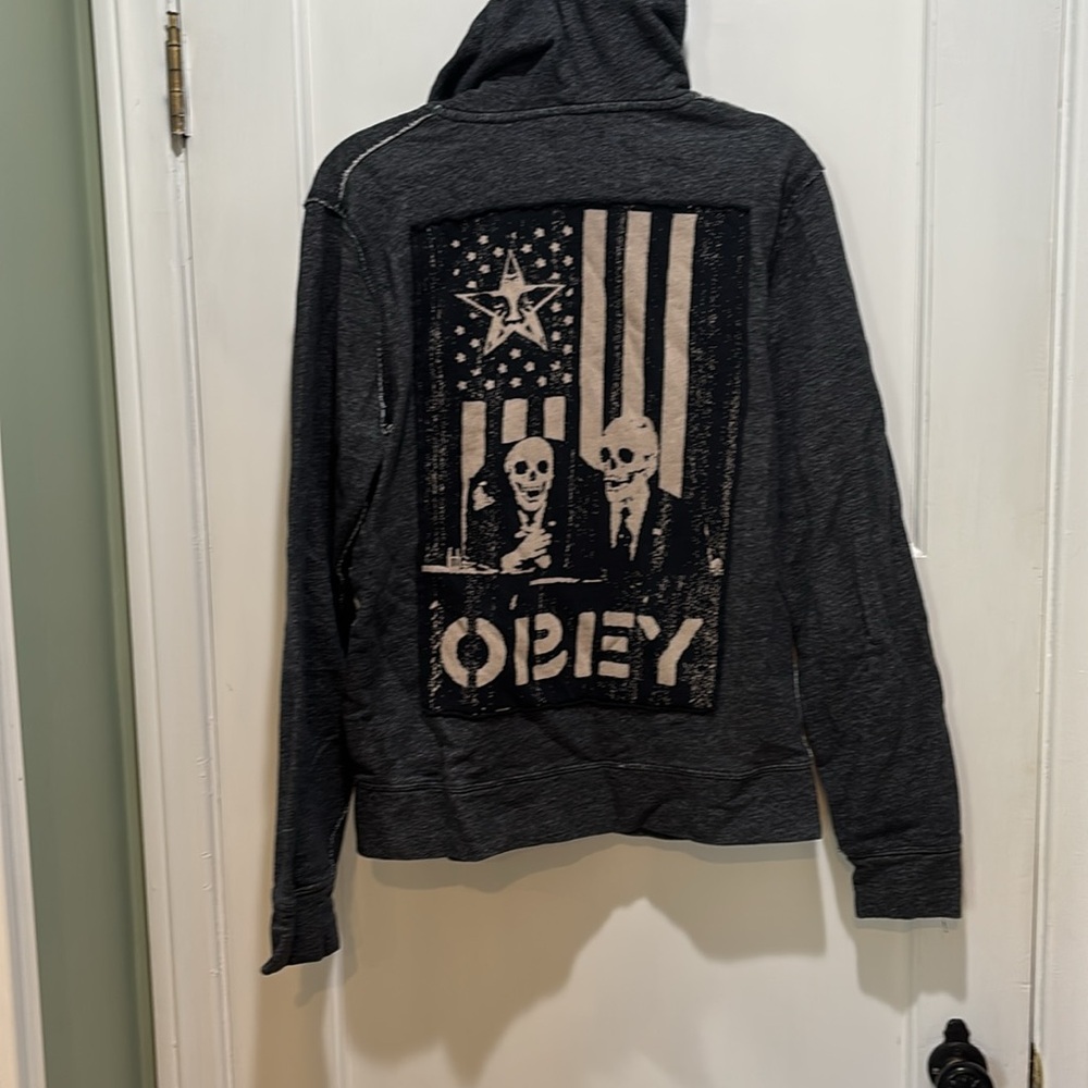 Obey distressed hoodie with skeletons and flag small